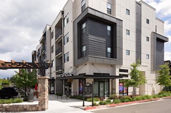 a rendering of the exterior of a building with a sign that reads pier house